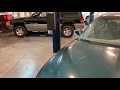 How to use a 2 post asymmetrical lift to raise a car