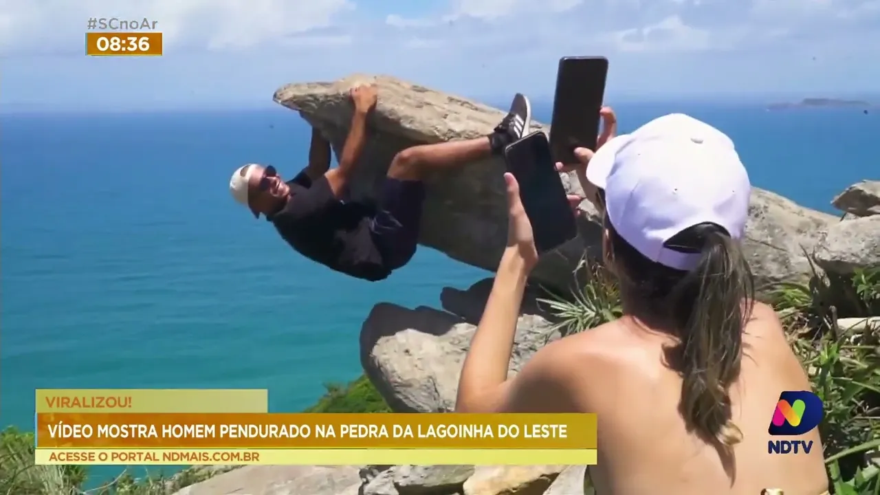 Vídeo mostra homem pendurado na pedra da Lagoinha do Leste