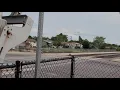 Southbound Frontrunner train passes by on a windy day