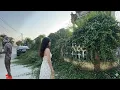 Download Lagu The girl stood outside the fence looking at her deceased parents' house, she was very sad.