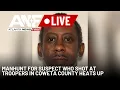 CATCH UP QUICK Manhunt for suspect who shot at troopers in Coweta County heats up after new tips