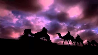 مشهد قافلة تسير في الصحراء ليلا 