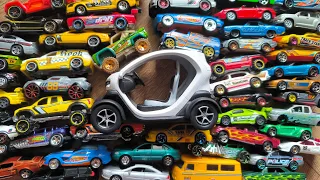 Strange Shaped Toy Car Among Smaller Size Cars
