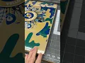 Applying a large laminated sticker to a Mainstay table from Walmart
