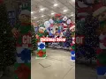 Christmas Decor at Lowe s Flocked Christmas Trees With Red Hollies