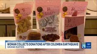 Woman collects donations after Colombia eart uake