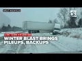 TEAM COVERAGE Wintry blast brings traffic headaches to West Michigan