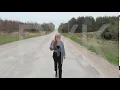 Download Lagu Young woman strides down country road.    (Nic6r)