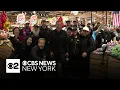 CBS News New York greets Wegmans shoppers for Season of Giving Check Out Hunger campaign