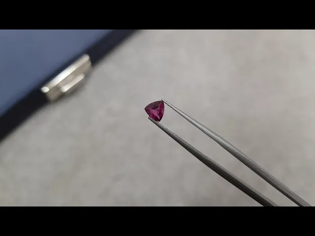 Unheated hot pink sapphire in trillion cut 0.71 ct, Madagascar Video  № 2