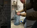 The water cooler is beeping