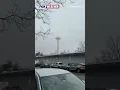 Rare March Snow Falls In Seattle Near The Space Needle