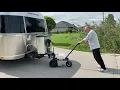 TX6000 Power Dolly moving an 7300 pound Airstream Globetrotter up a 8 grade