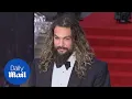 Jason Momoa rocks black tux at No Time To Die London premiere