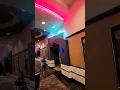 Edwards Regal Stadium Cinema hallway walkthru with veiling neon lights Irvine CA 2023