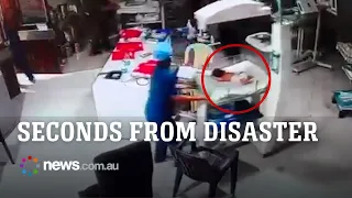 Heart-stopping moment medics race to save newborn babies from raging hospital fire