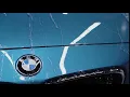 Stock Footage BMW M4 Blue Water Behavior Front Close Up