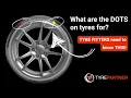 What do the red yellow DOTS on tyres mean