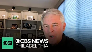 Lou Tilley congratulates Ukee Washington on 40 years at CBS Philadelphia