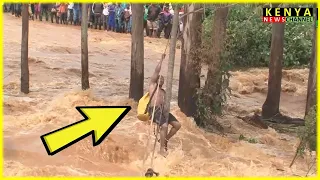 Download MAN DRAMATICALLY RESCUED FROM WILD RIVER IN KENYA FLOODS MP3