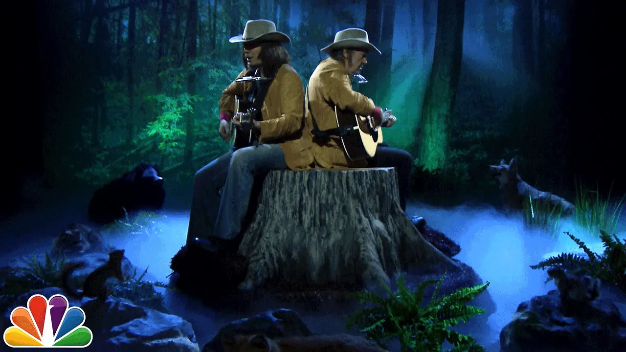 Two Neil Youngs on a Tree Stump