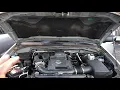 Nissan Frontier - Radiator coolant reservoir location