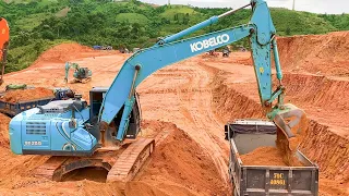 Download Big Blue Excavator Kobelco SK250 Loading Trucks - Mining Soil MP3