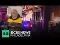 Two people are dead after a fire rips through Trenton homes displacing nine