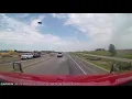 Brick through windshield