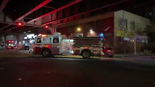 FDNY ENGINE 75 RESPONDING ON JEROME AVENUE IN THE BRONX IN NEW YORK CITY