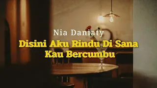 Nia Daniaty - Di Sini Aku Rindu Disana Kau Bercumbu (Official Video Lyric)