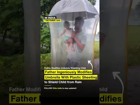 Father's Genius Umbrella Hack to Protect His Child from Rain! 🌧️❤️ #shorts #youtubeshorts