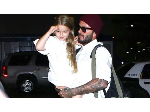 Download MP3 David Beckham Carries Daughter Harper Through LAX