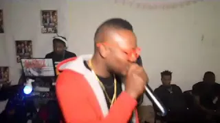 mc arsenal and mc hold something on stage