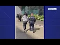Harris County tax office bribery scheme Four charged one fugitive still on the run