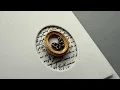 Download Lagu A CAS card with a resin embellishment
