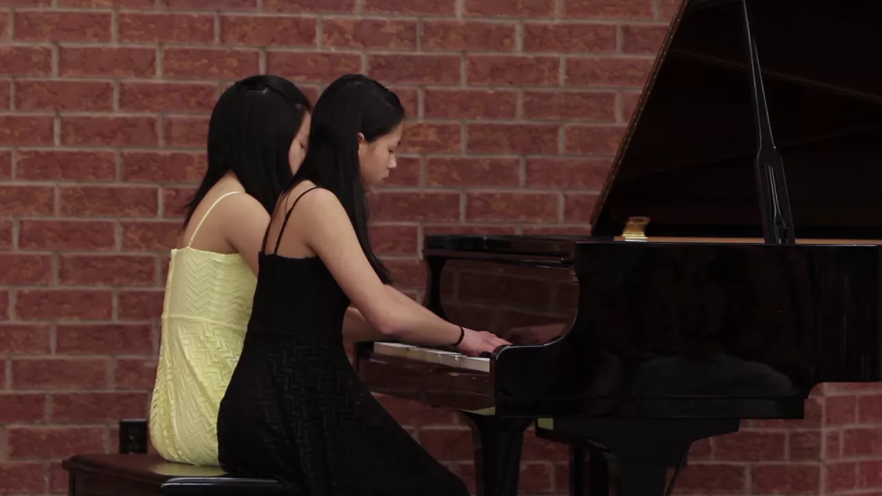 Janey and Emily Lao Performing "Morning has Broken" by Melody Bober