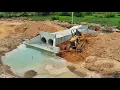 Buried the 7x10 twin drainage at the road in the village under construction