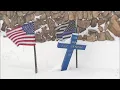 Cross In Snow Is Reminder Of Dangerous Driving Conditions On Highway 285