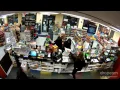 surveillance from Monroe MI gas station robbery Suspect leaves wallet behind