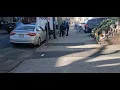 Jersey city police responding to a call about a FedEx truck hit a park car
