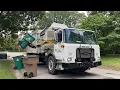 Metro Nashville Public Works garbage truck collecting recycling