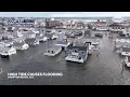 Aerial shows parts of Hampton Beach flooded from high tide