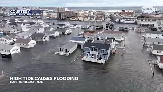 Aerial shows parts of Hampton Beach flooded from high tide