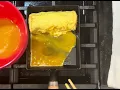 Tamagoyaki rolled omelet in a cast iron tamagoyaki pan