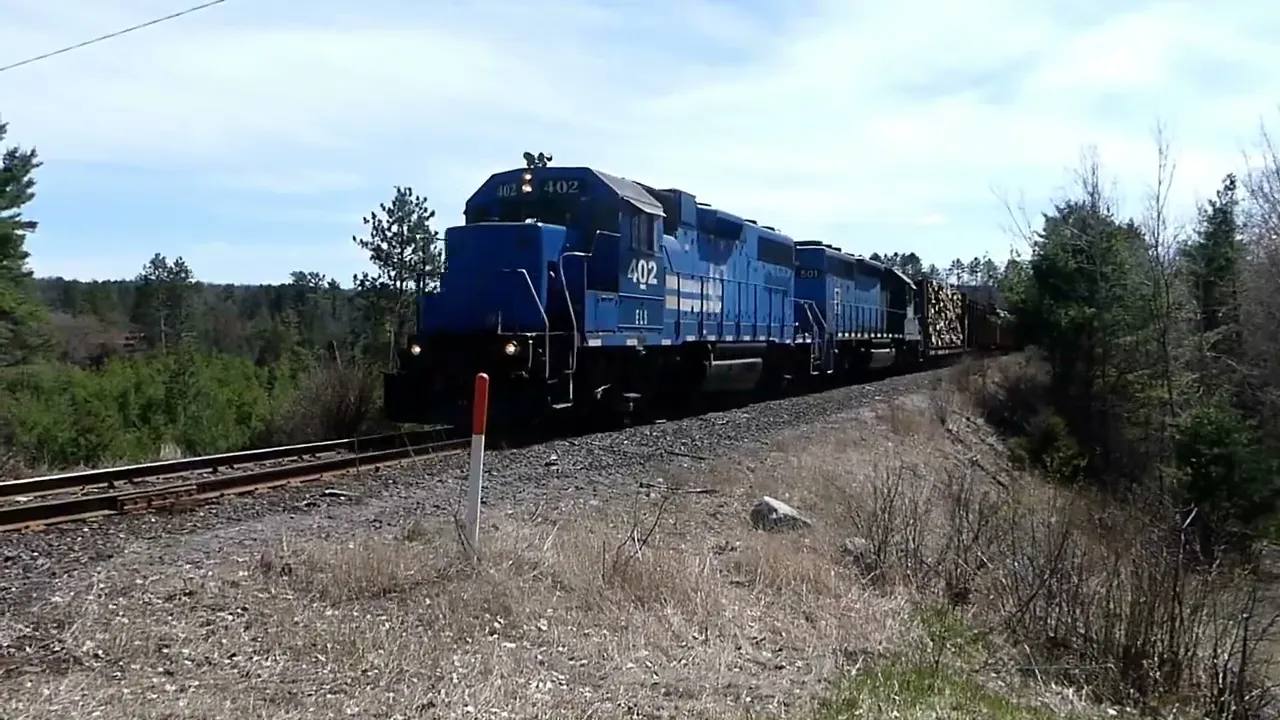 SURPRISE SUNDAY TRAIN CHASE OF FALLING LOGS & A CREEPY GUY WATCHING TOO! | Jason Asselin