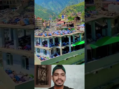 The mosque is full of worshippers, and people are offering prayers on the roof.