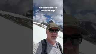 Hiking the Italian Dolomites on Seceda Ridge. Beautiful hike on snow covered alps. #travel