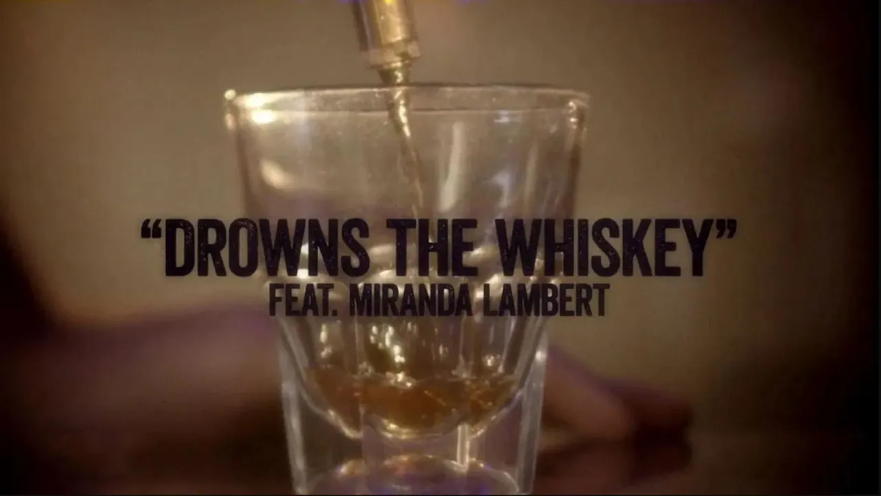 Drowns the Whiskey (feat. Miranda Lambert) (Lyric Video)