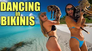 Dancing Girl in Bikinis with Puppies, Does it get better?